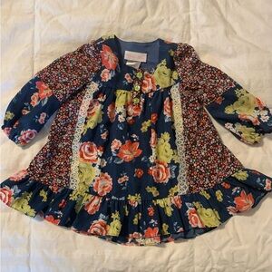Girls size 24 months Floral Long Sleeve Dress. Ruffled hemline.